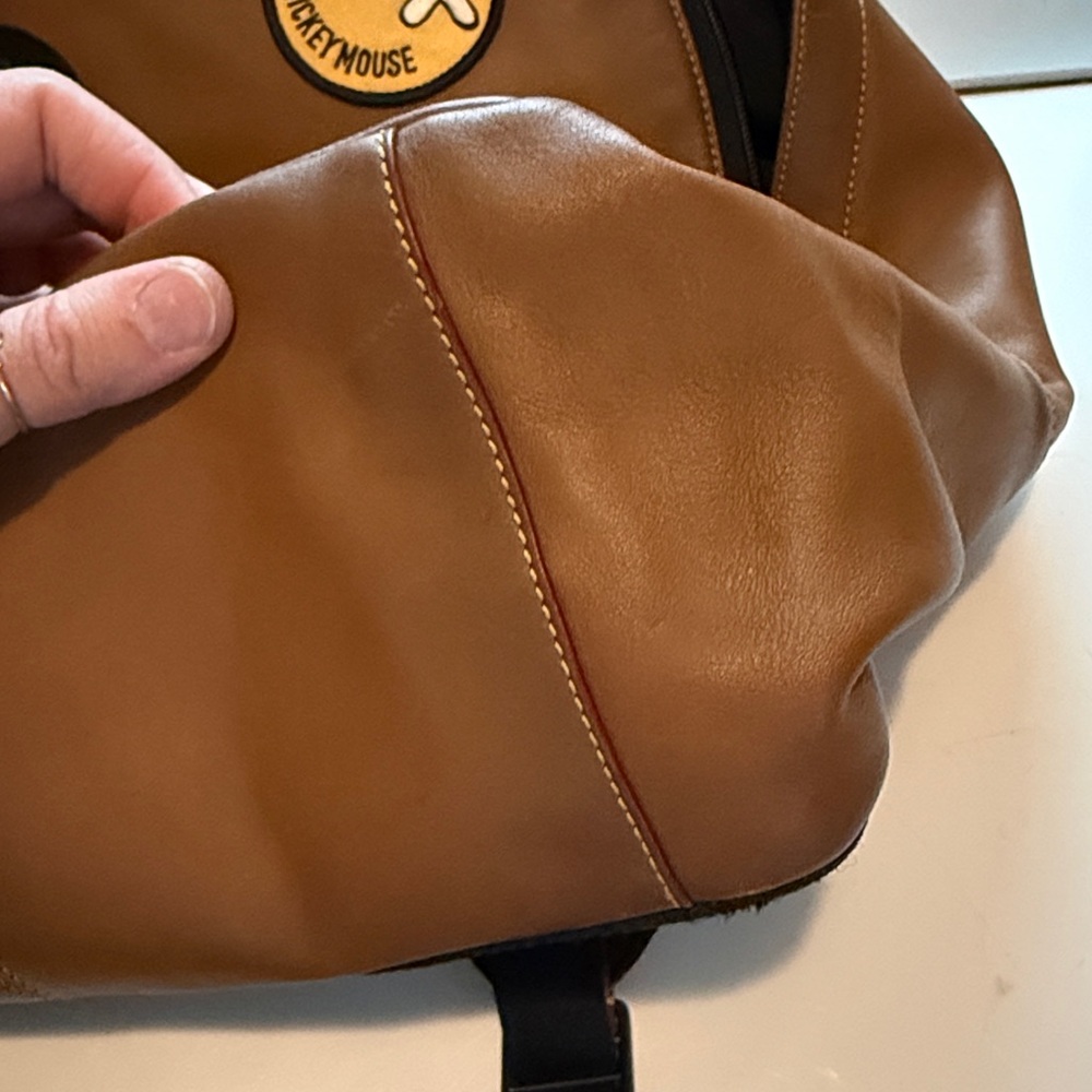 Disney’s Coach Tan Backpack with Mickey Mouse Patches - Picture 6 of 8